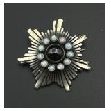 Silver brooch