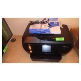 HP ENVY ALL IN ONE PRINTER W/ SOME PAPER-TURNS ON
