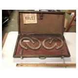 CASE WITH HORSESHOES
