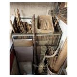 LARGE LOT OF WOODEN RODS AND CABINET