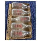 Milk bottles