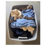 Tote with linens and clothing