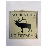 Metal no hunting sign