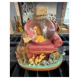 Lady and the tramp snow globe