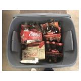 TOTE OF COKE BOTTLES