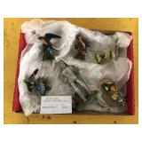 TIN MAN AND BIRD FIGURINES