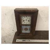 CLOCK WITH PENDULUM AND KEY