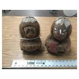 PAIR OF COCUNUT STATUES