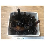 BOX FULL OF AMBER BOTTLES