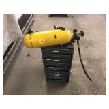 BOTTLE AND METAL CABINET