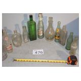 Twelve Vintage Bottles