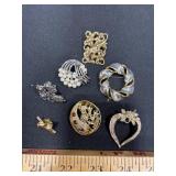 Seven Assorted Brooches/ Pins
