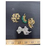 Four Rhinestone Brooches