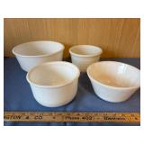 Four White Bowls