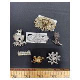 Seven Decorative Pins/ Brooches