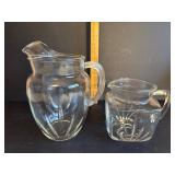 Two Clear Glass Pitchers