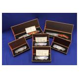 GROUP OF (6) FALKNER KNIVES, AMERICAN MINT; (4)