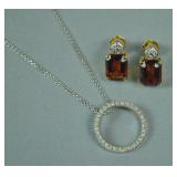 DIAMOND HALO PENDANT ON CHAIN & A PAIR OF EARRINGS