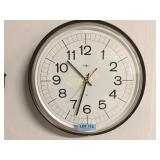 Howard Miller clock - wall-mounted, dbl A Battery