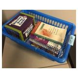 Health compendiums in blue tote