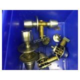 Door handle sets including dead bolts and door sto