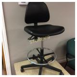 Stool on casters, molded plastic seat