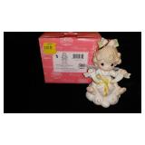 Precious Moments All Wrapped Up in Love