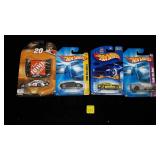 Several Hot Wheels Cars in Packaging