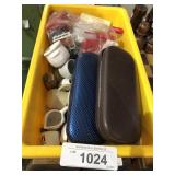 assorted cermaic pieces and eye glass containers