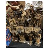 assortment of paper mache people