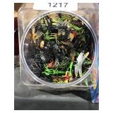 tub of plastic bugs