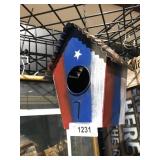 red white and blue metal birdhouse