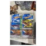 4 Hot Wheels Treasure Hunt Die Cast Cars in Case