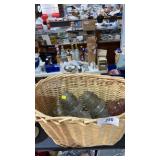 10 Glass Insulators in Wicker Basket