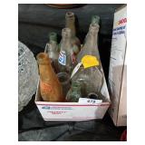 Collection of 13 vintage glass bottles