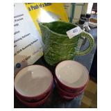 Porcelain pitcher and soup bowls