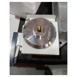 Aluminum hook and loop grinder holders.