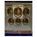 MJ Hummel glass ornaments.