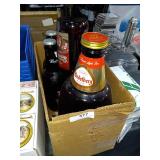 Budweiser and Heidelberg oversized beer bottles.