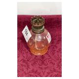 Small pink colored oil lamp base