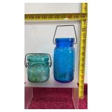 2 Vintage Bottles with handles, 1 w/ lid