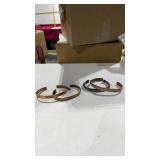 3 Copper Cuffs and 1 Silver Toned