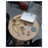 Assorted jewelry pieces: necklace,  assorted