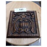Wooden door-knocker wall art.