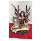 Fairy and  Wolf statue w/ small chip on wing