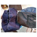 50. Skiing duffel bag with misc bags inside