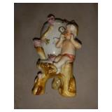 2. Porcelain baby and egg figurine