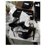 Never worn black strappy high heel size 9