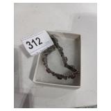 Silver Toned Bracelet w/ Red Stones