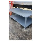 Large Rolling 2 shelf Table Cart.  Needs dents on